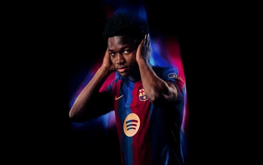 Player posing in Barcelona jersey with vibrant background Player posing in Barcelona jersey with vibrant background