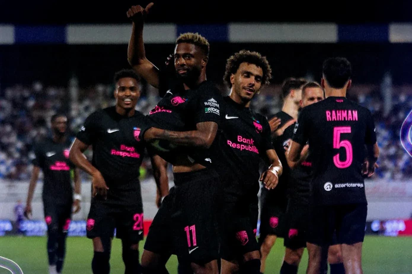 Players celebrating a goal during match Players celebrating a goal during match