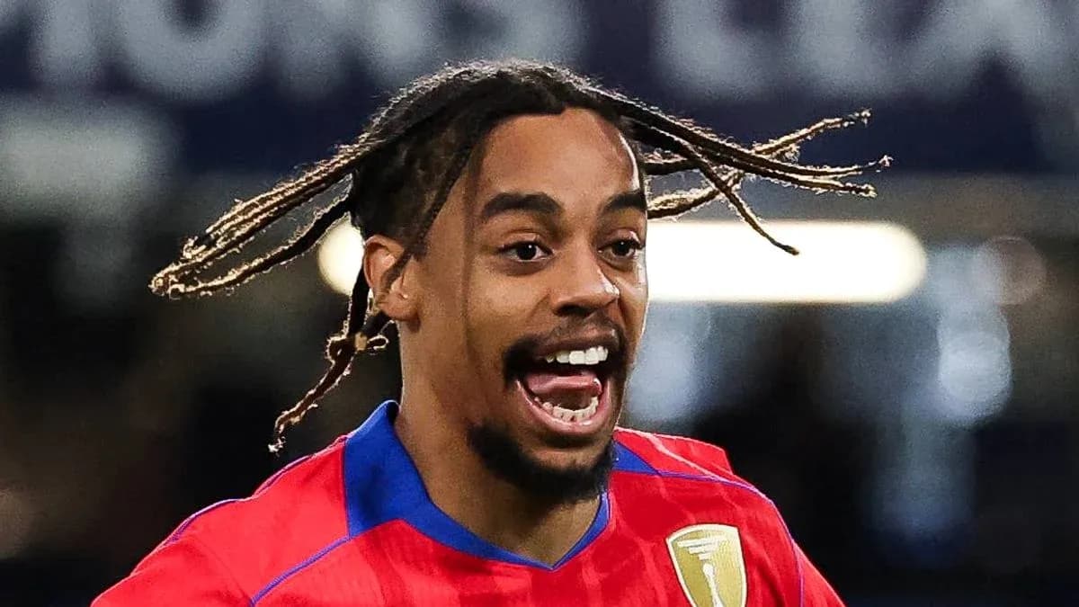 Player celebrating a goal in red jersey Player celebrating a goal in red jersey