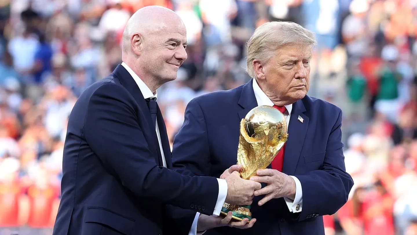 Gianni Infantino handing FIFA World Cup trophy to Donald Trump Gianni Infantino handing FIFA World Cup trophy to Donald Trump