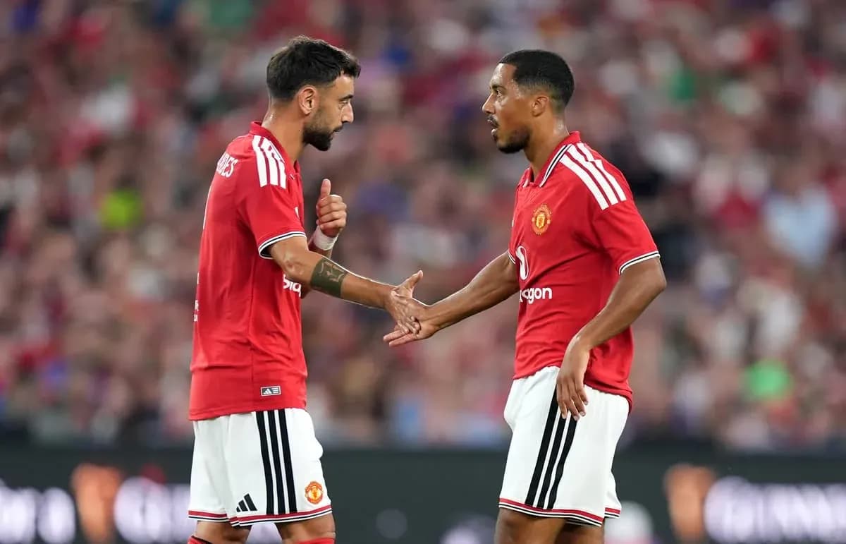 Two Manchester United players discussing during match Two Manchester United players discussing during match
