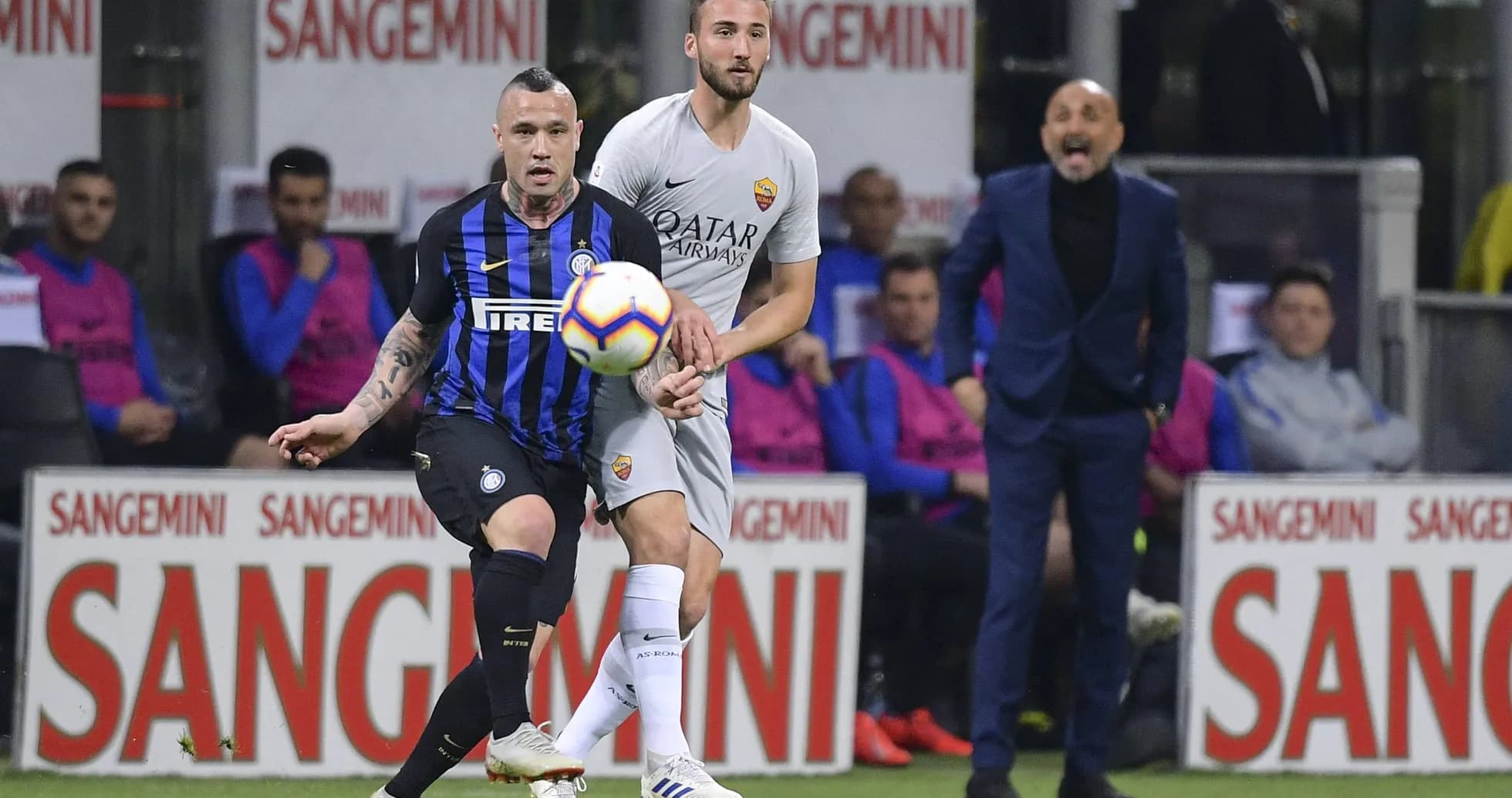 Inter and Roma players contesting for the ball Inter and Roma players contesting for the ball