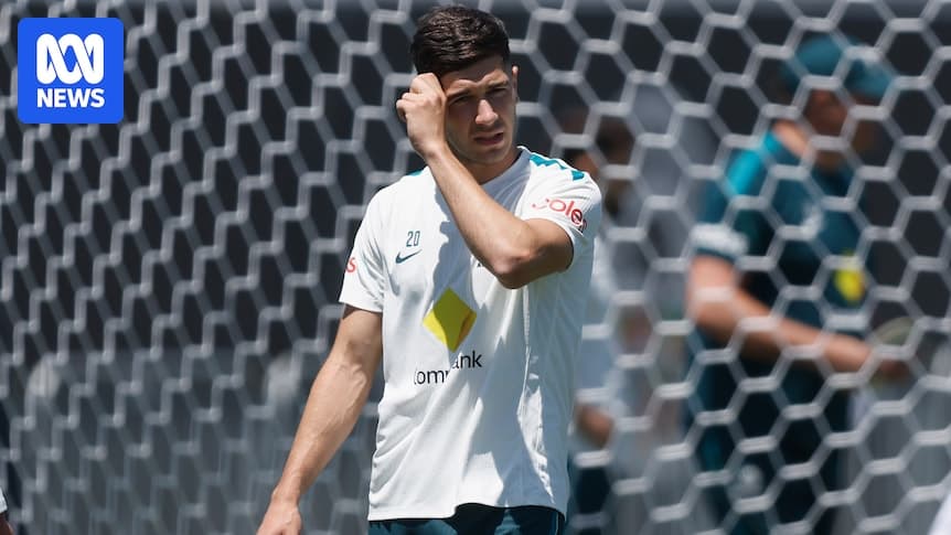 Player adjusting hair during training session Player adjusting hair during training session
