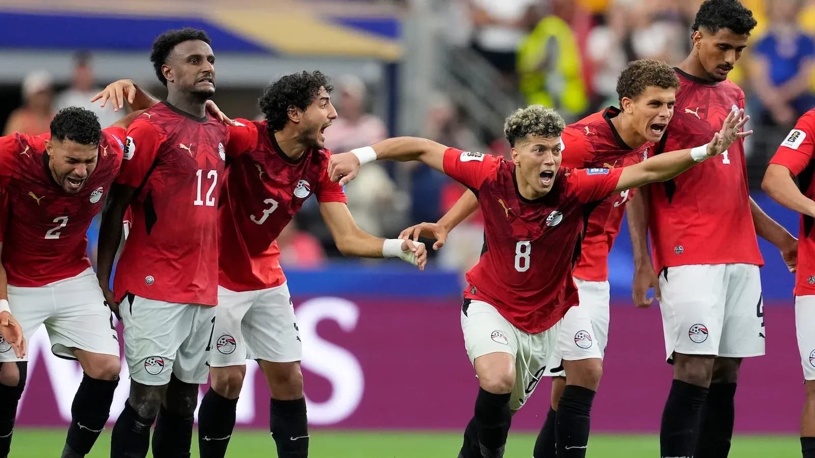 Egyptian players celebrating a goal during match Egyptian players celebrating a goal during match