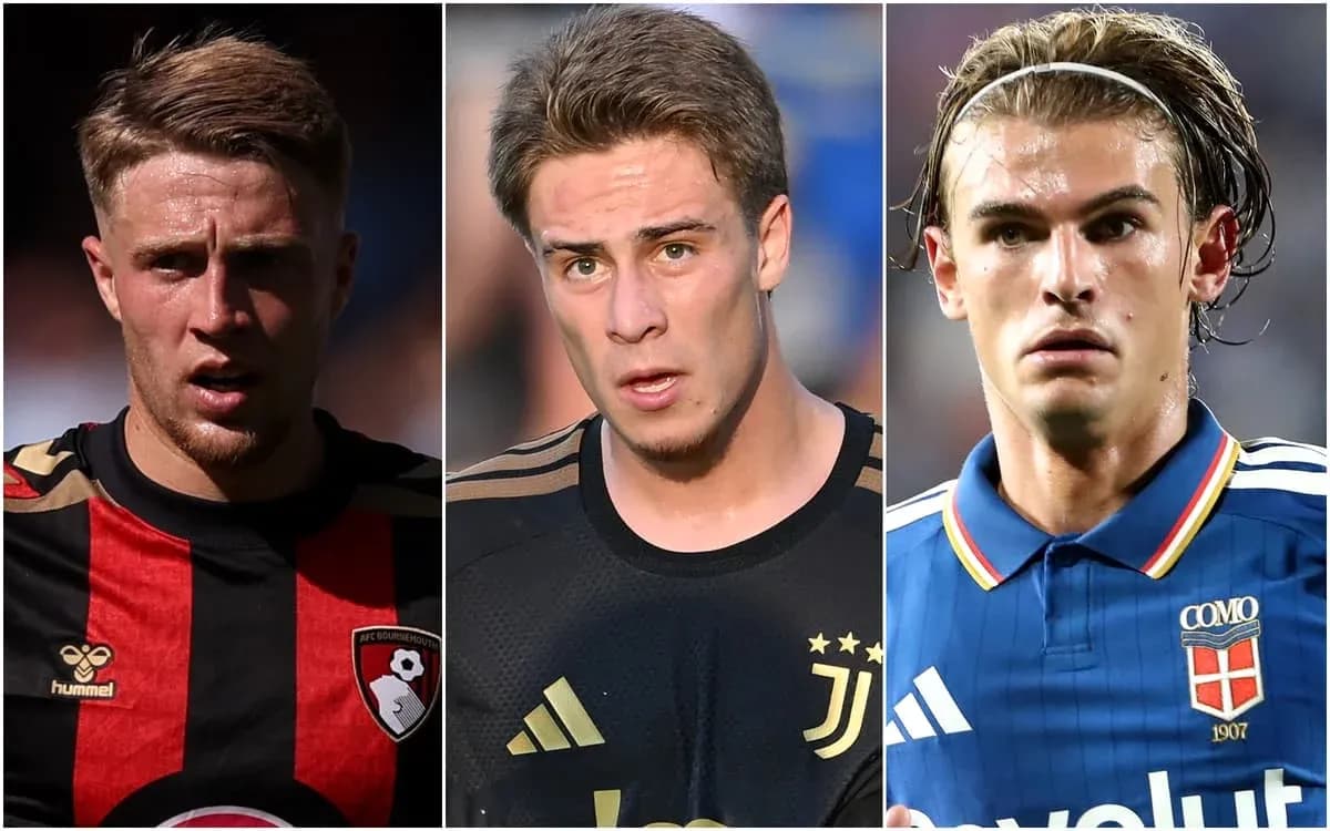 Three football players in their club jerseys Three football players in their club jerseys