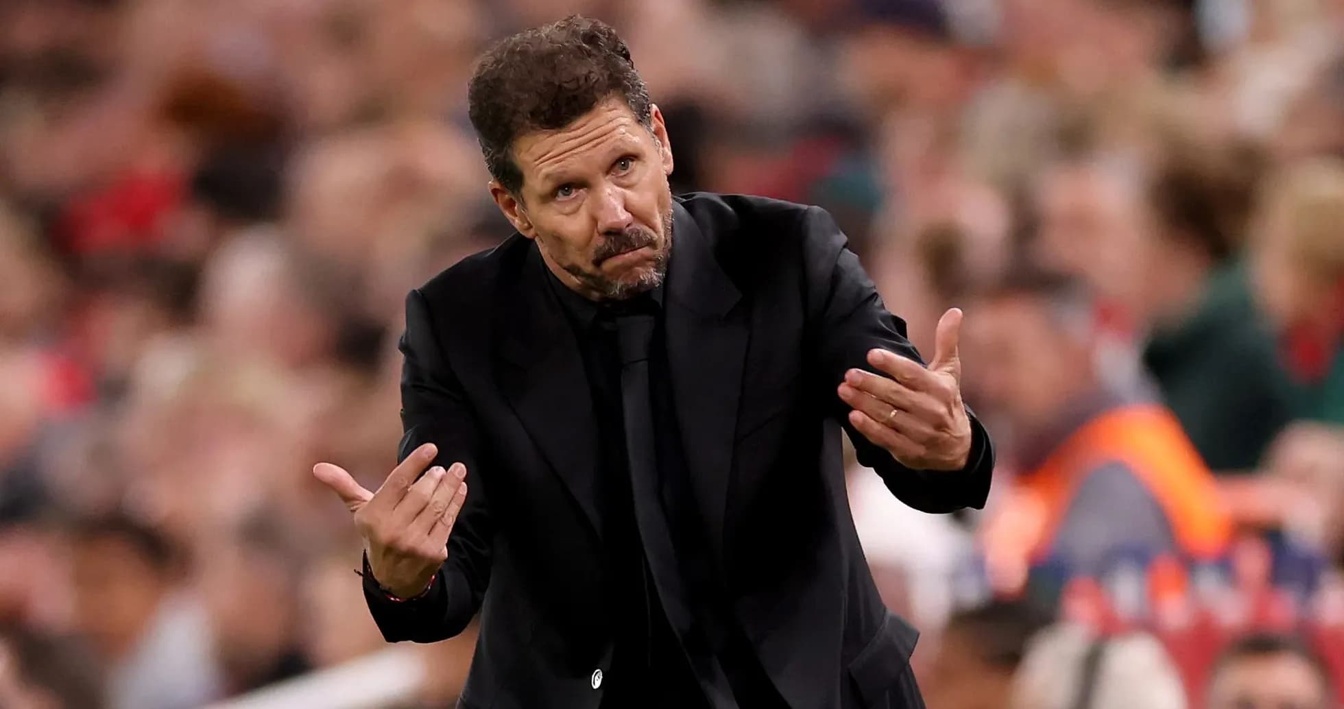 Manager gesturing during a football match Manager gesturing during a football match