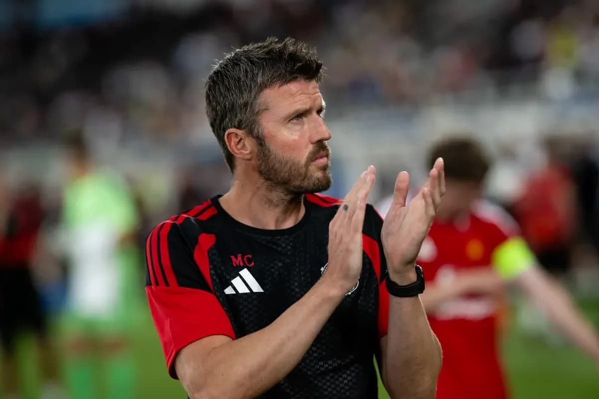 Coach applauding during post-match warm-up Coach applauding during post-match warm-up