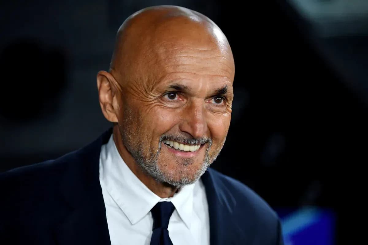 Smiling man in suit during event Smiling man in suit during event
