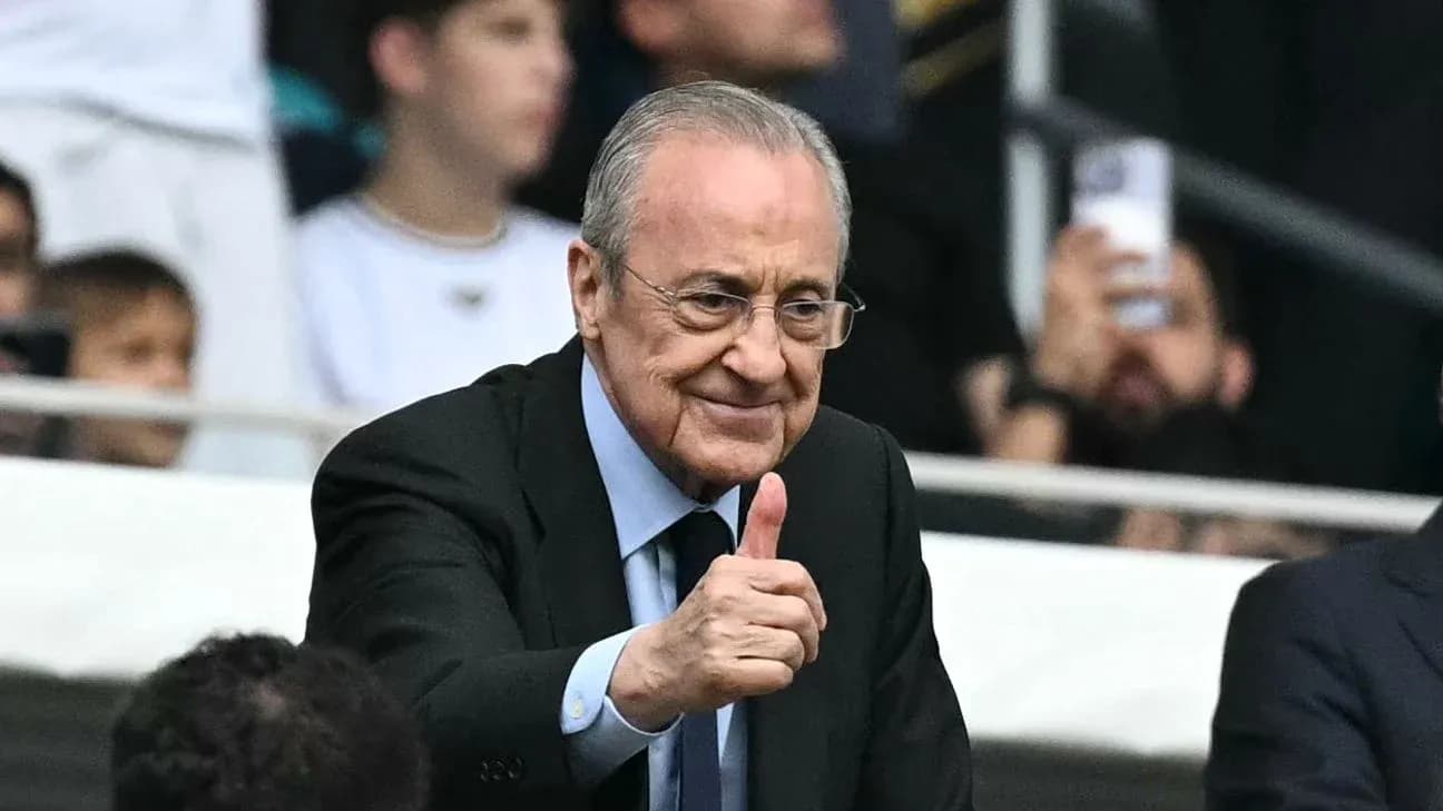 Man giving a thumbs up in a stadium Man giving a thumbs up in a stadium