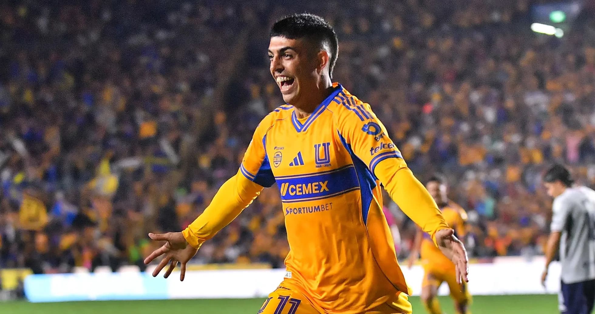 Tigres UANL player celebrating a goal Tigres UANL player celebrating a goal