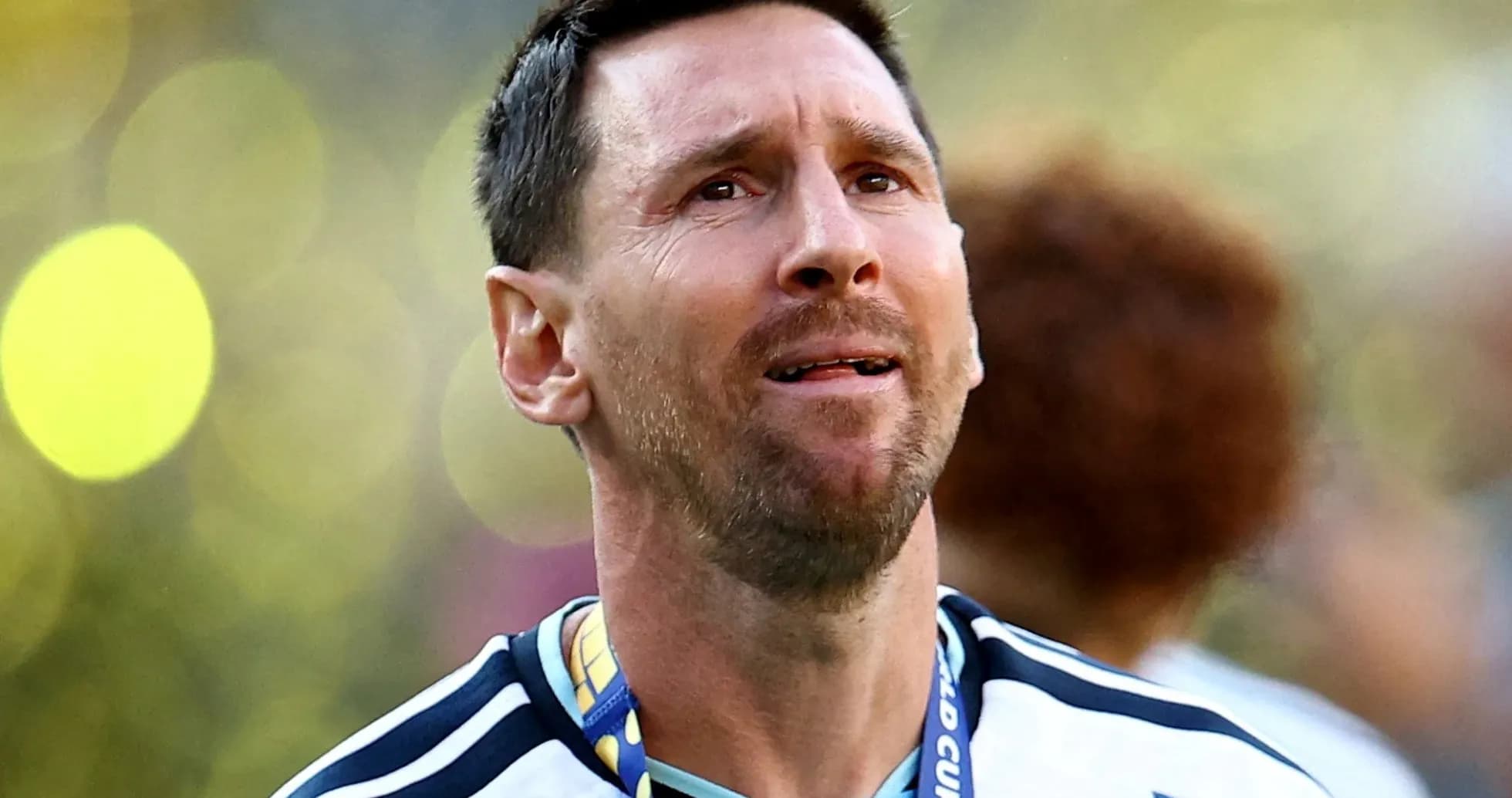 Player wearing Argentina jersey with medal around neck Player wearing Argentina jersey with medal around neck