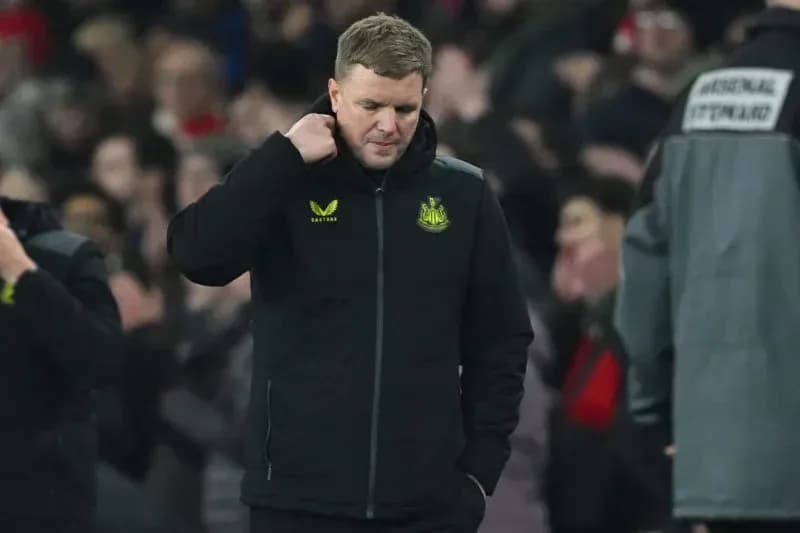 Newcastle United manager walking off field after match Newcastle United manager walking off field after match