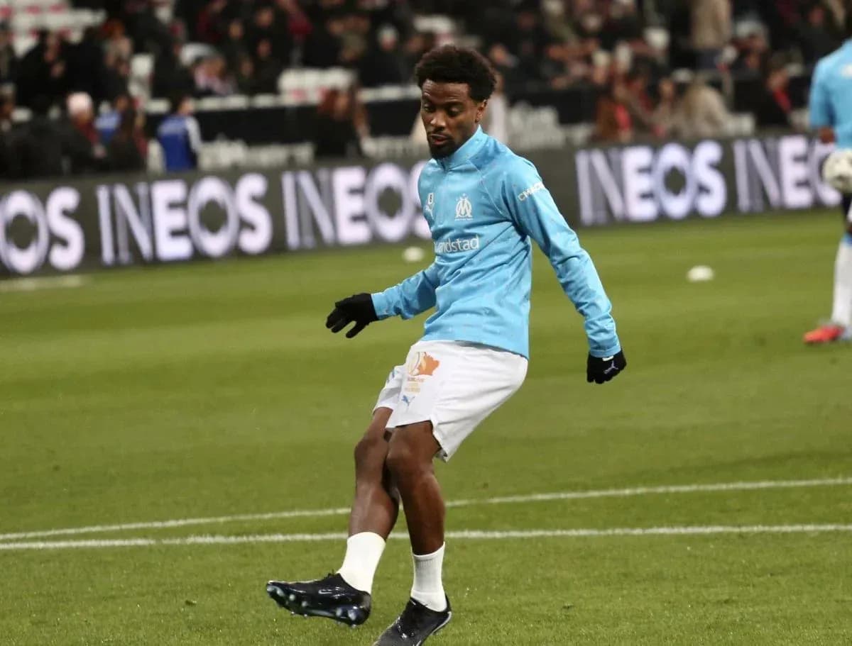 Player warming up on pitch before the match Player warming up on pitch before the match