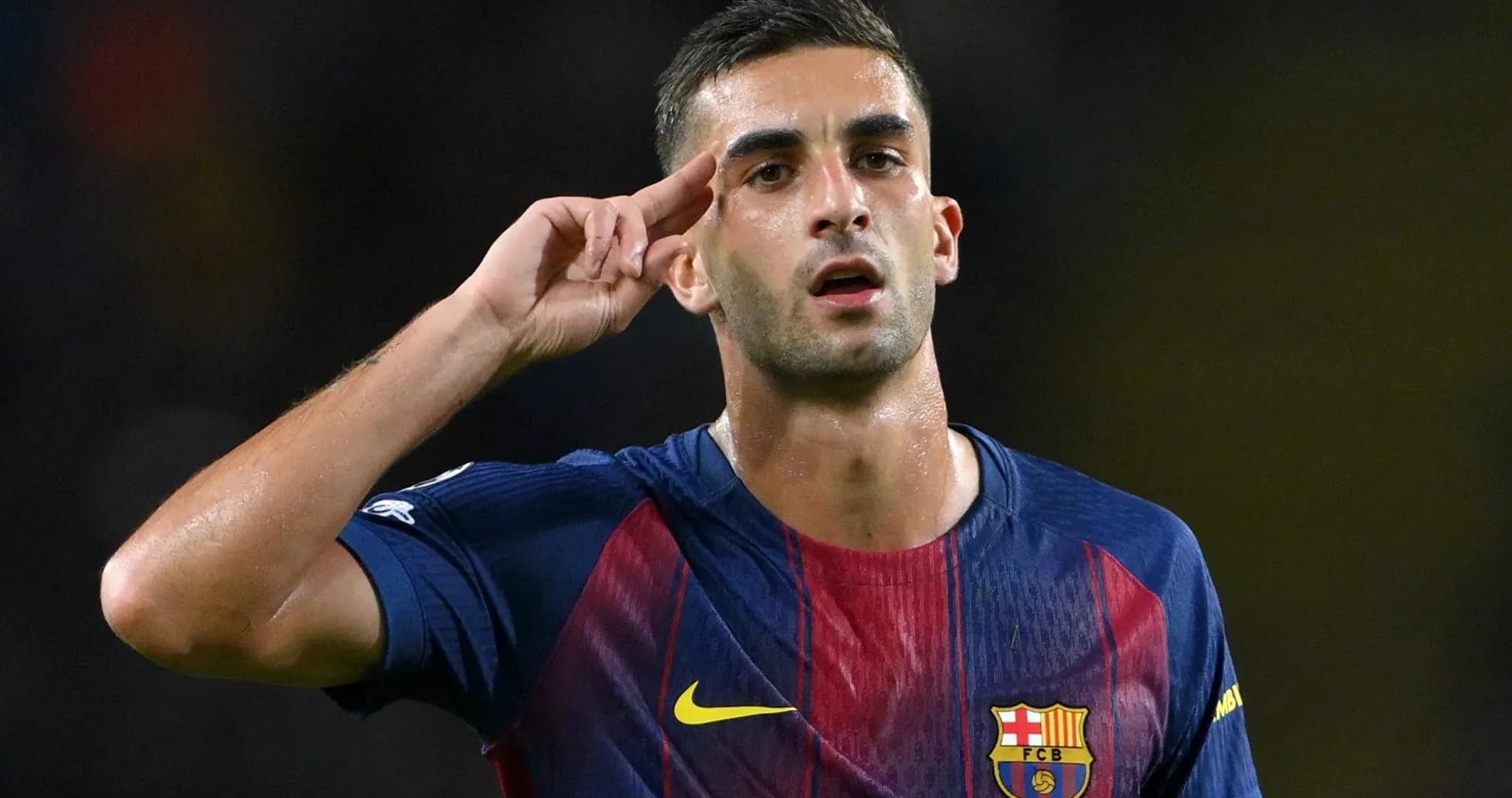 Player saluting fans after scoring a goal Player saluting fans after scoring a goal