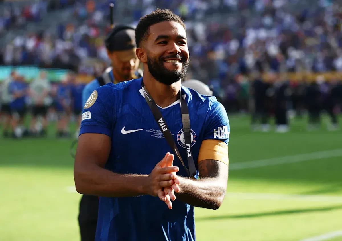 Player in blue jersey celebrating on the field Player in blue jersey celebrating on the field