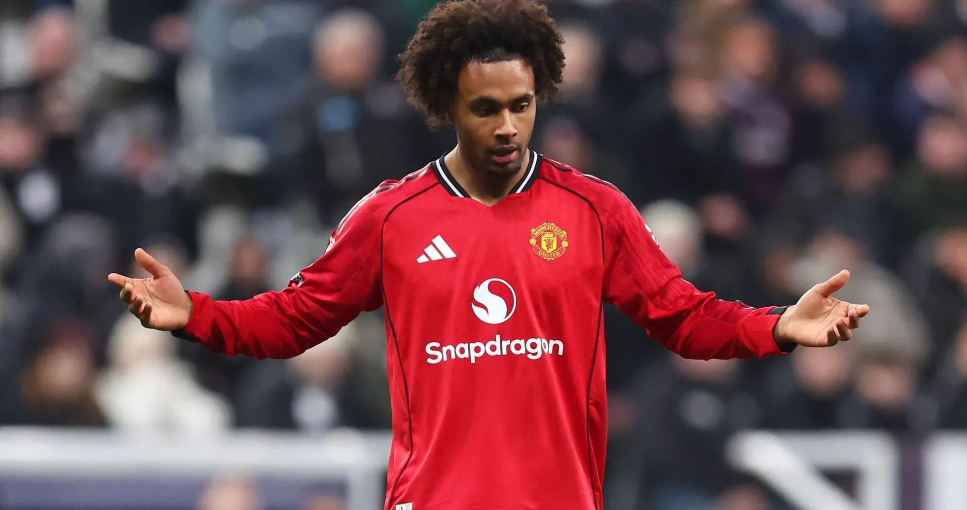 Player in red Manchester United jersey during match Player in red Manchester United jersey during match