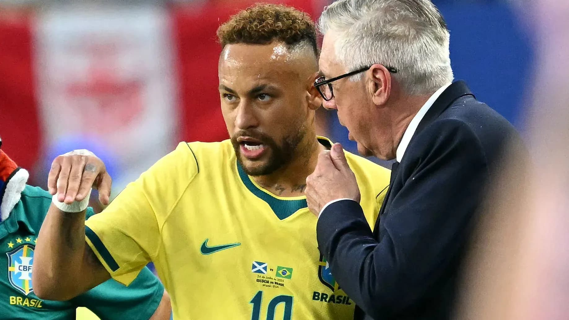 Neymar discussing with coach during match Neymar discussing with coach during match