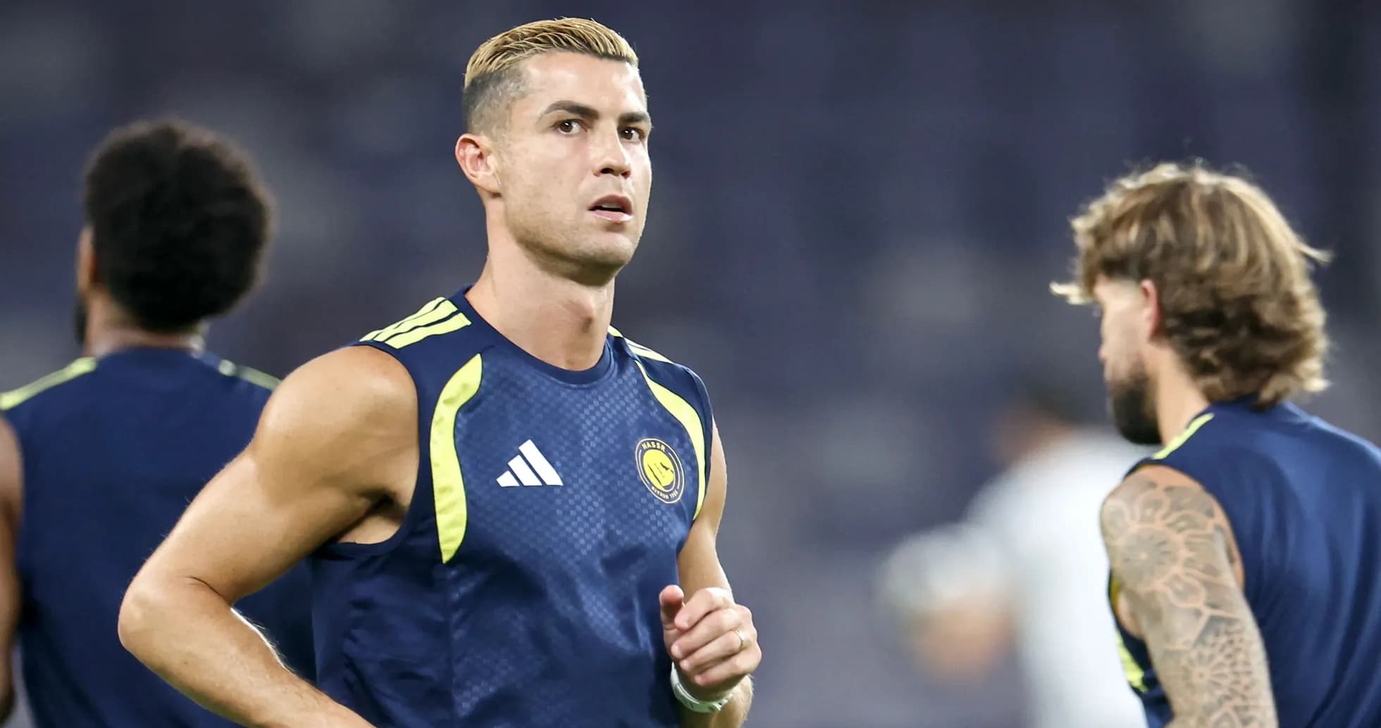 Cristiano Ronaldo training with teammates on field Cristiano Ronaldo training with teammates on field