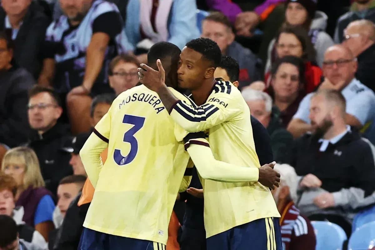Two players embracing on the sidelines during match Two players embracing on the sidelines during match