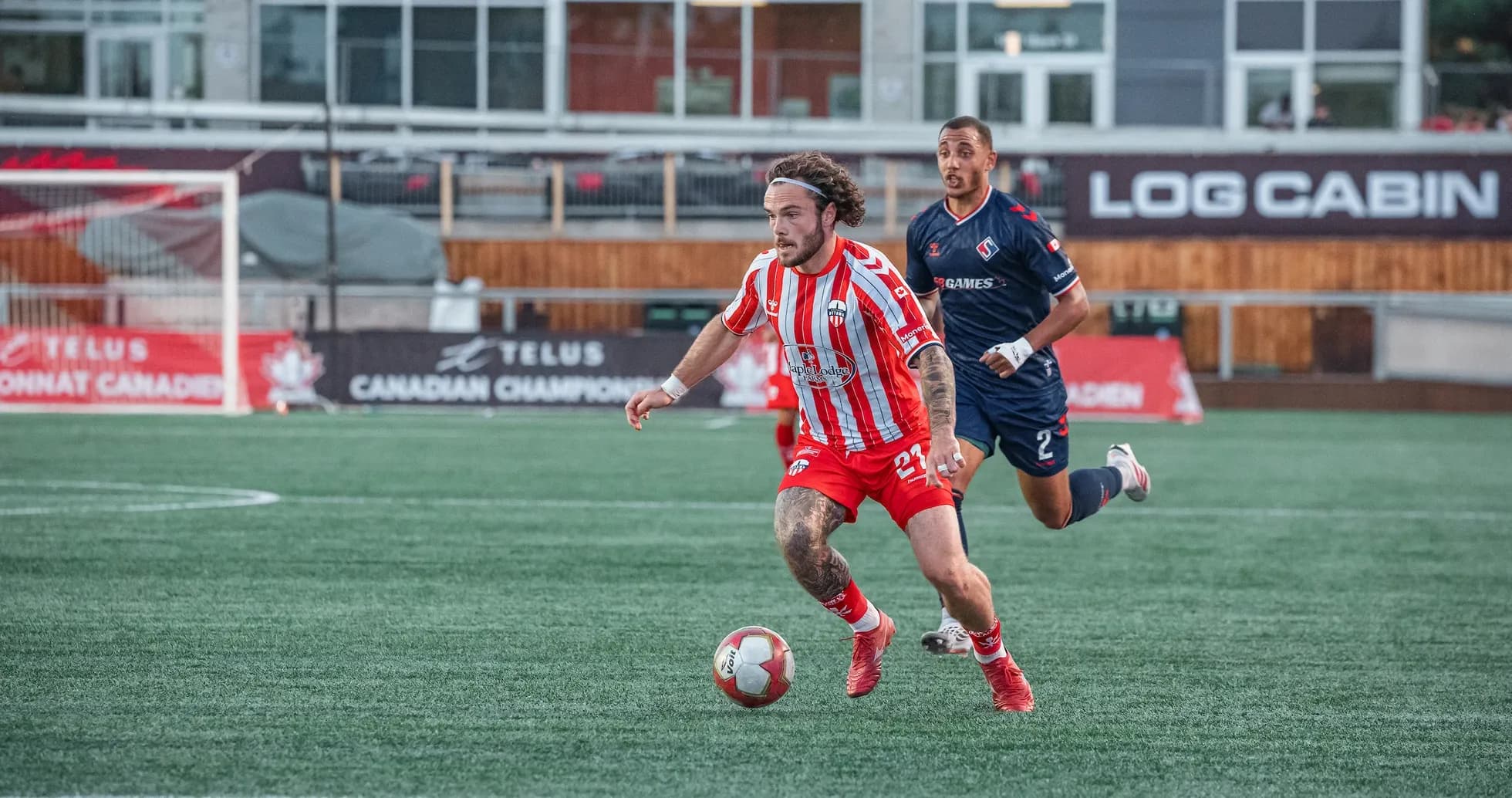 Player dribbling the ball during match Player dribbling the ball during match