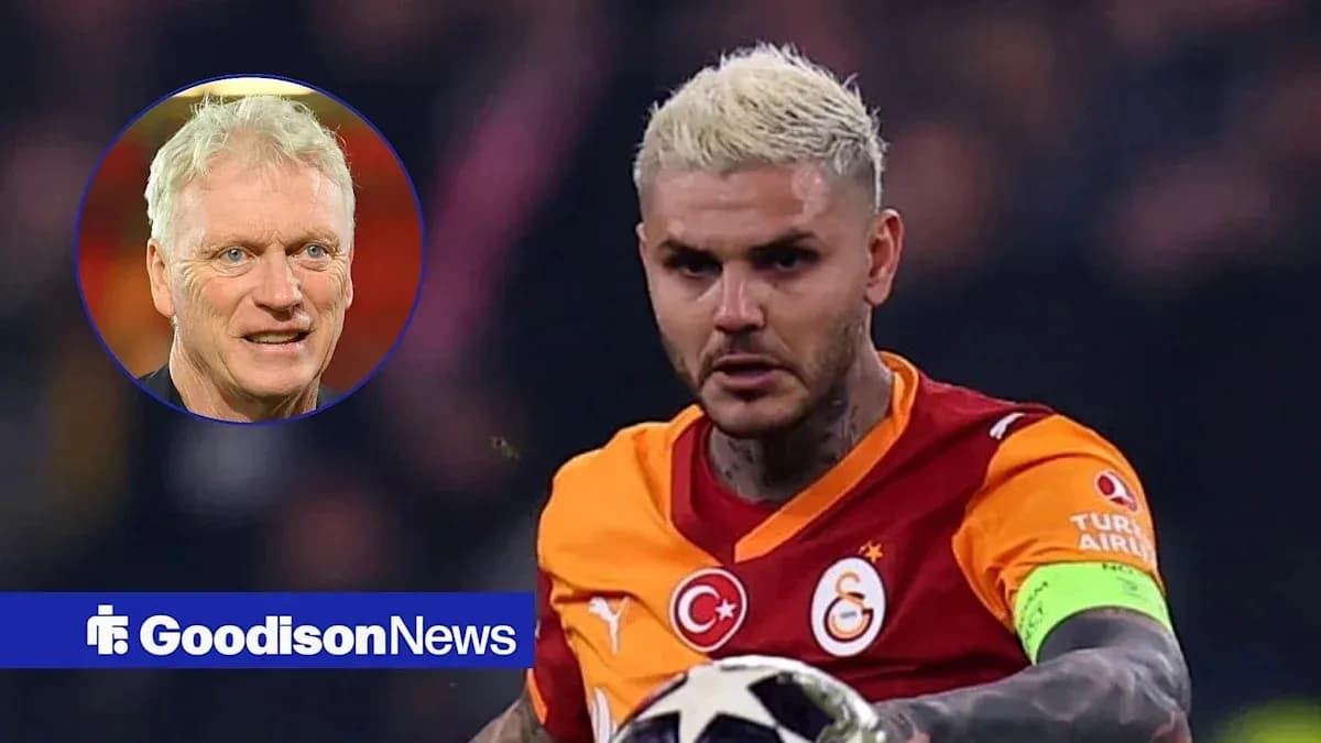 Player in Galatasaray jersey preparing to pass ball Player in Galatasaray jersey preparing to pass ball