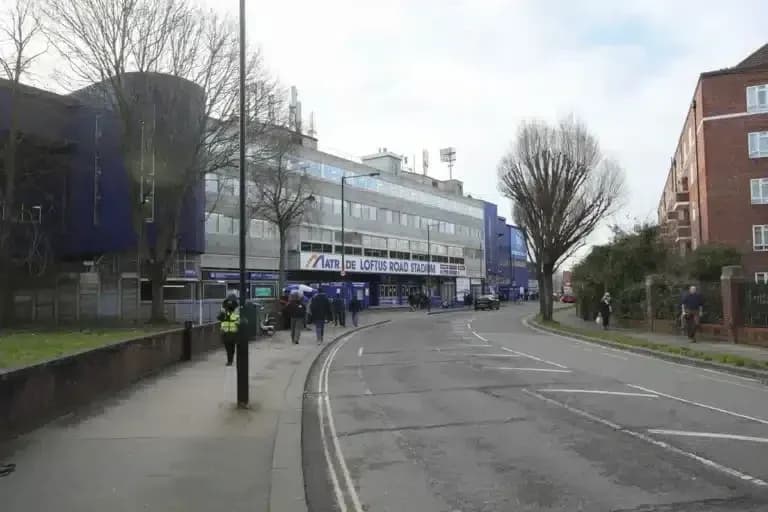 Exterior view of Loftus Road Stadium on a street Exterior view of Loftus Road Stadium on a street