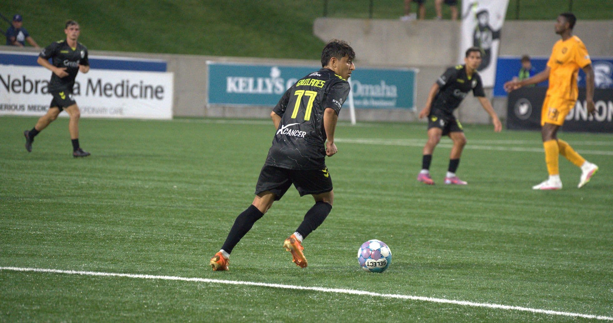 Player dribbling the ball during Union Omaha match Player dribbling the ball during Union Omaha match