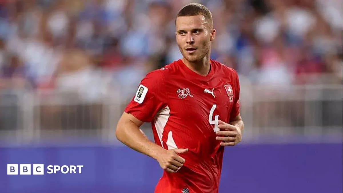Player wearing red Switzerland jersey during match Player wearing red Switzerland jersey during match