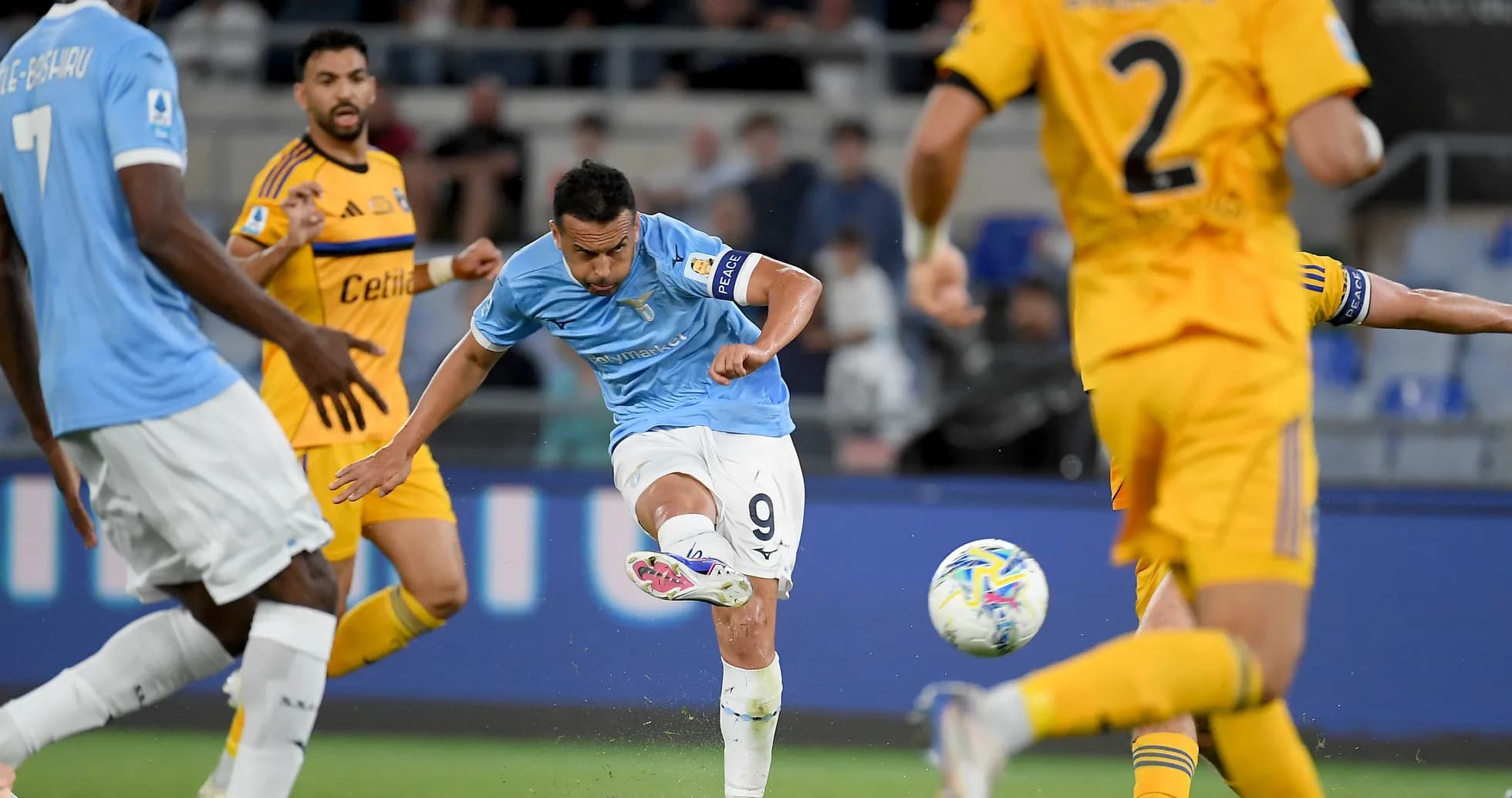 Lazio player kicking the ball during match Lazio player kicking the ball during match