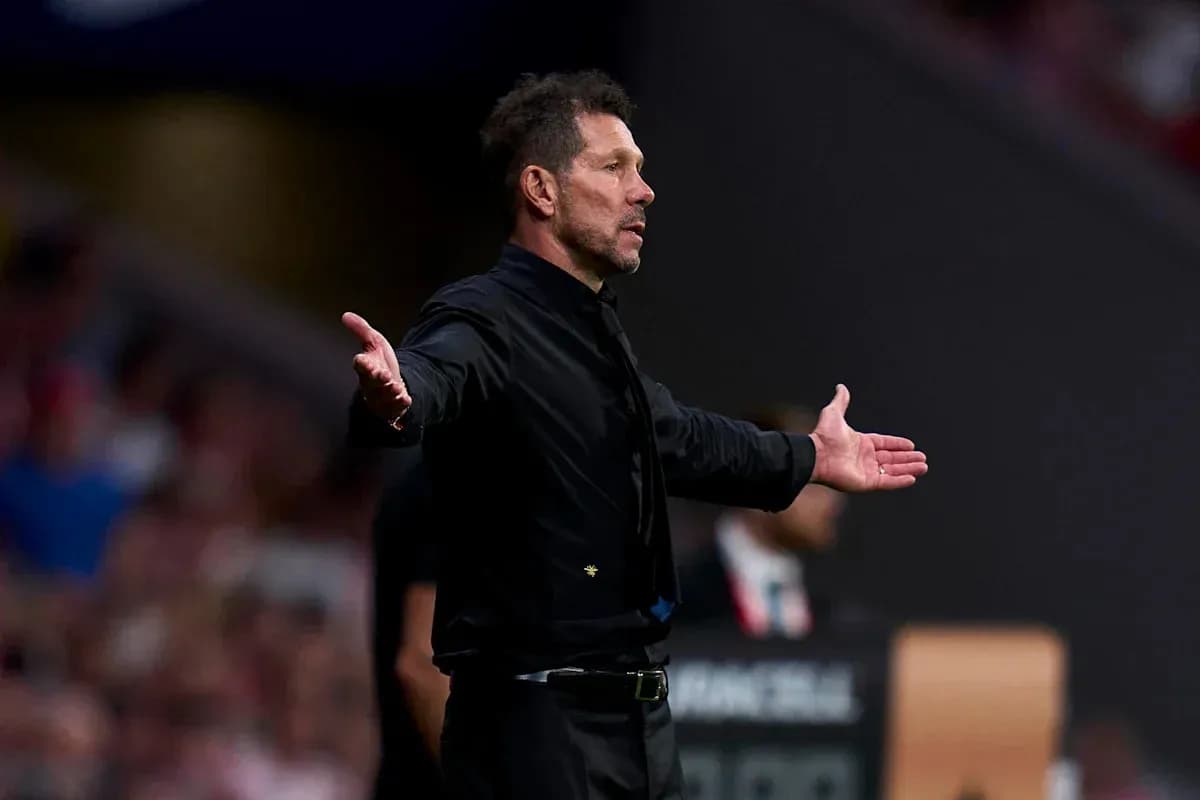 Coach gesturing during a match on the sideline Coach gesturing during a match on the sideline