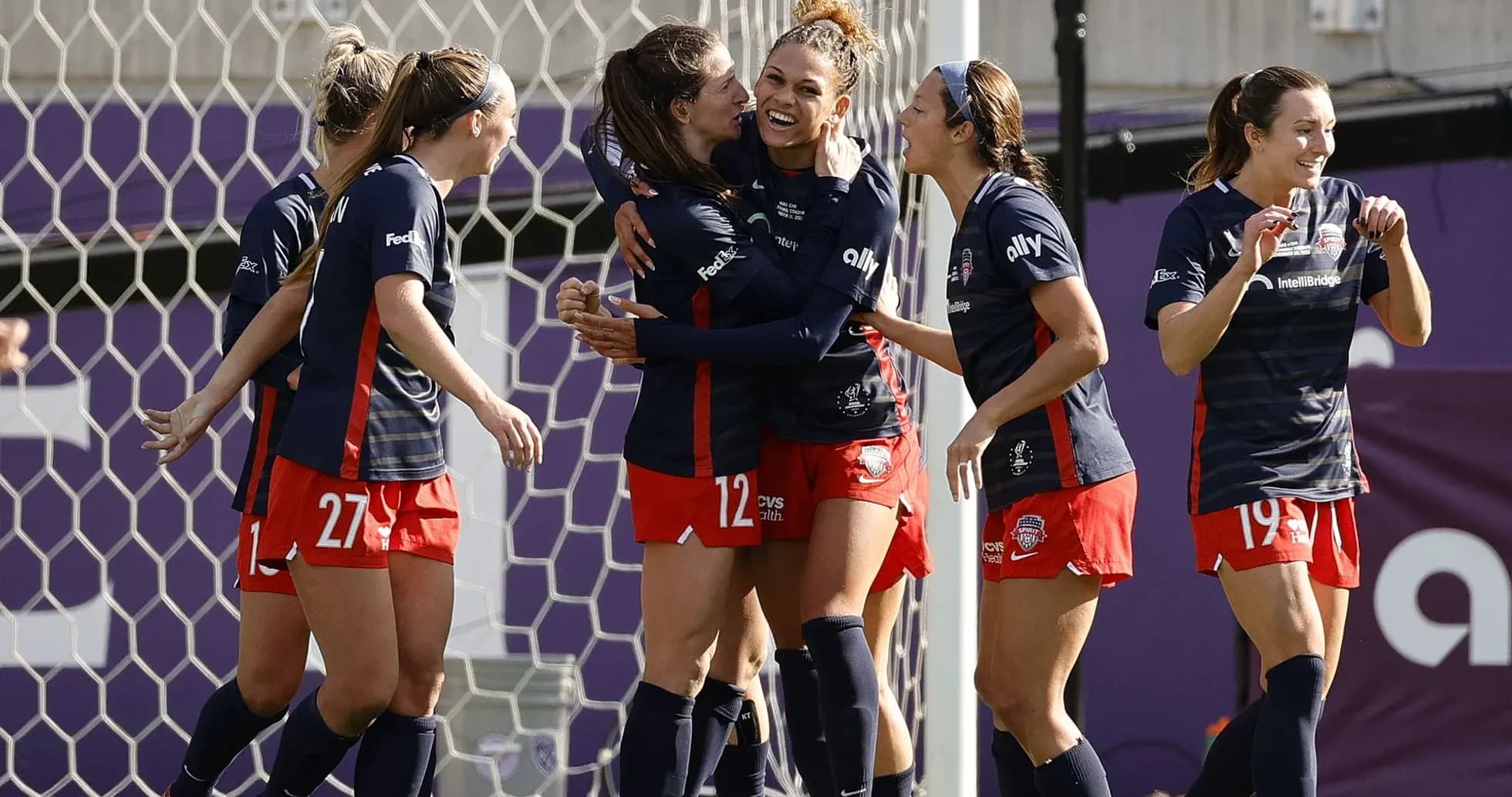 Washington Spirit players celebrating a goal Washington Spirit players celebrating a goal