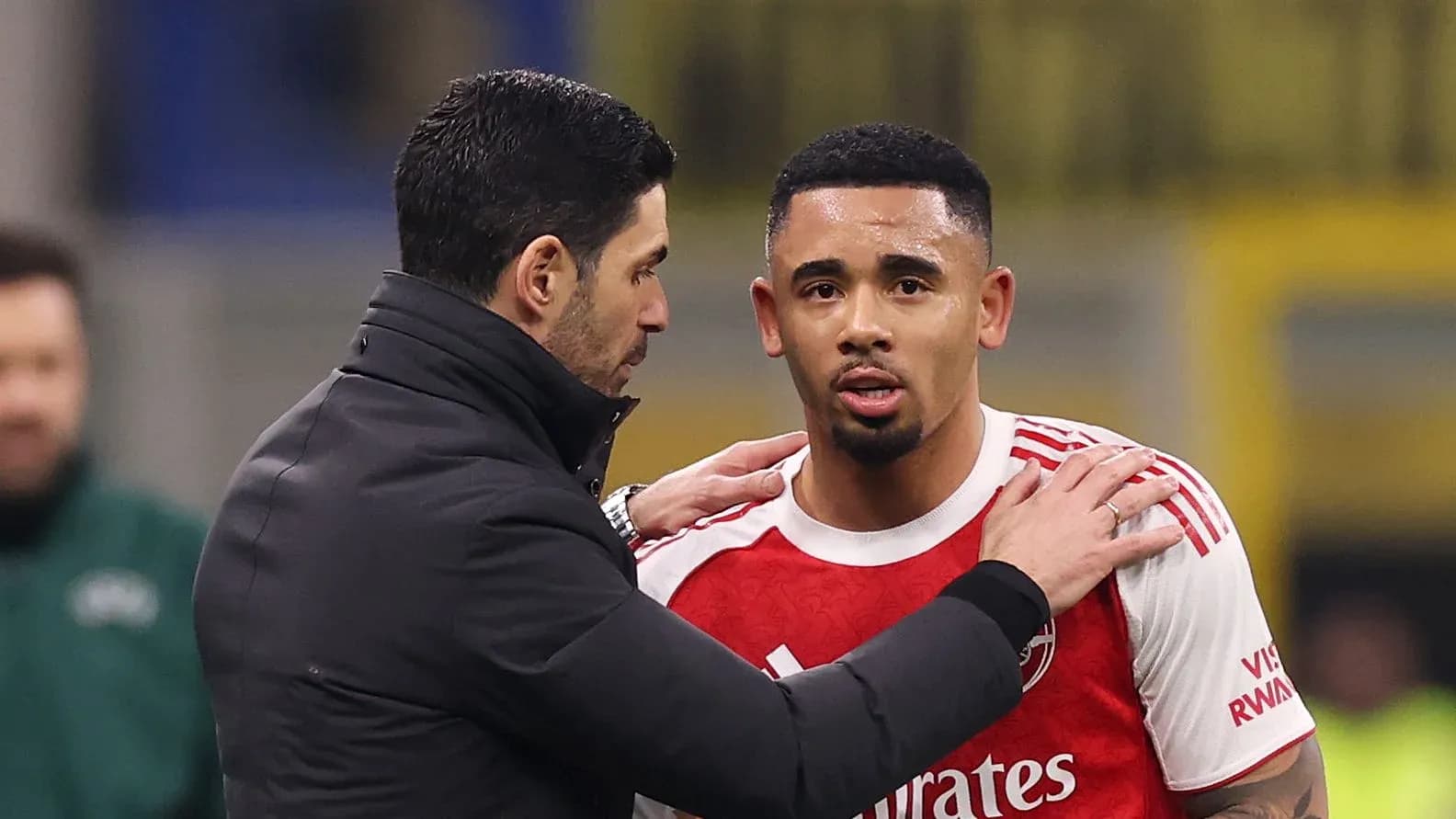 Coach speaking to player during match substitution Coach speaking to player during match substitution