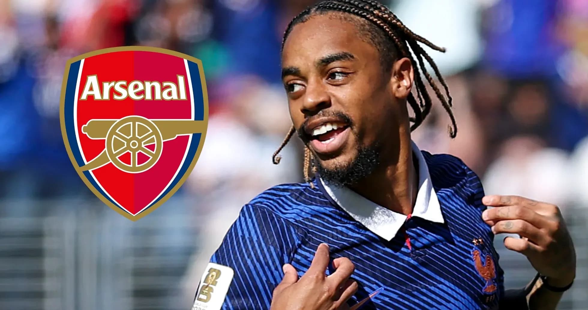 Player celebrating with Arsenal logo in background Player celebrating with Arsenal logo in background