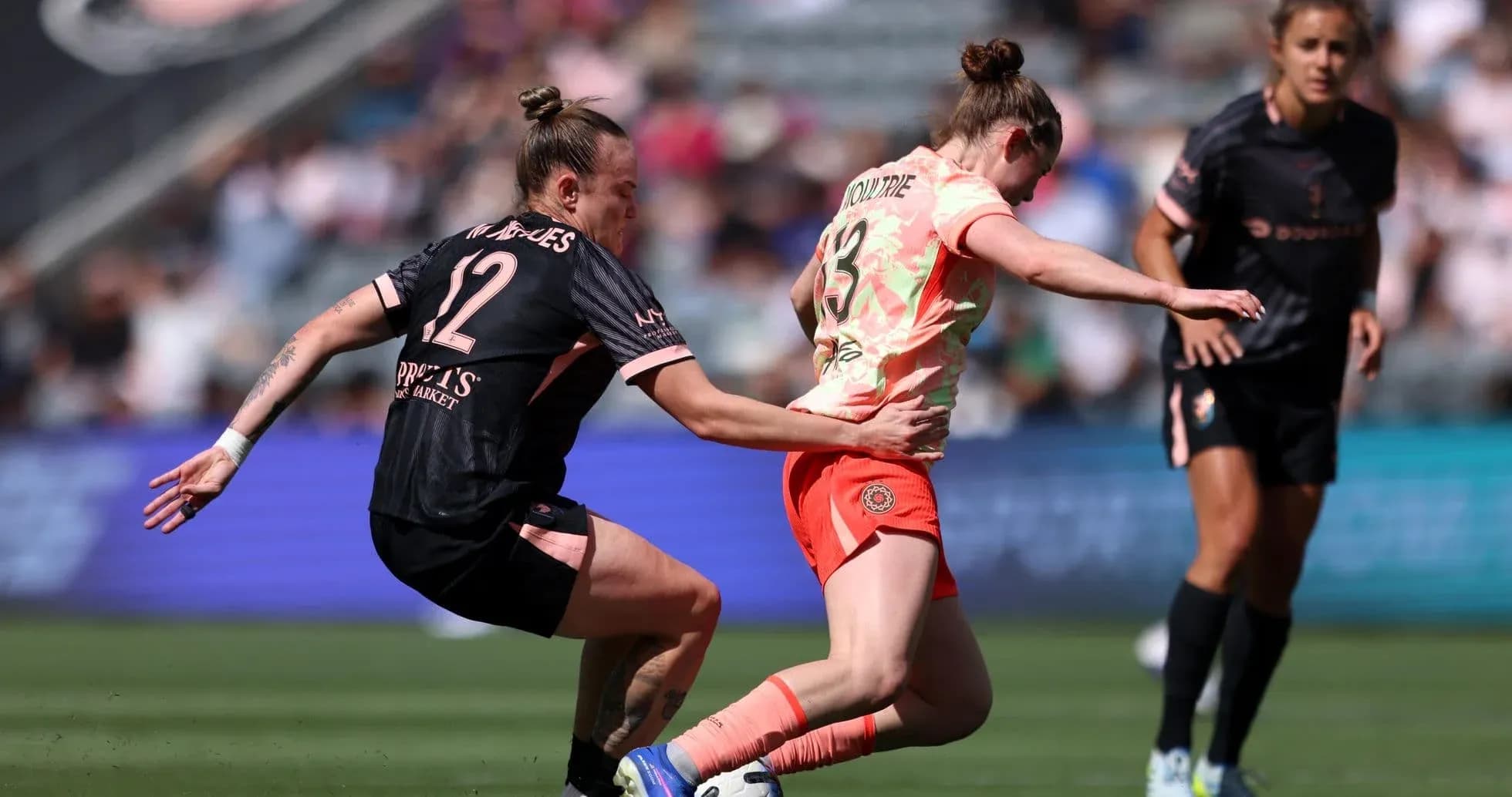 Portland Thorns player battling for the ball Portland Thorns player battling for the ball