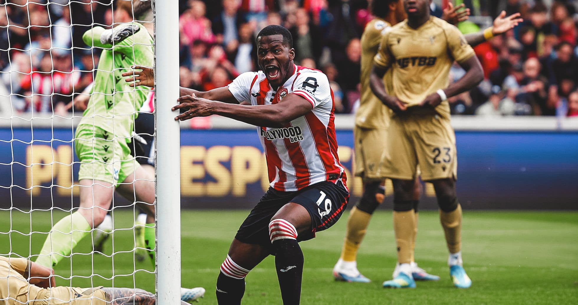 Brentford player celebrating near goal during match Brentford player celebrating near goal during match