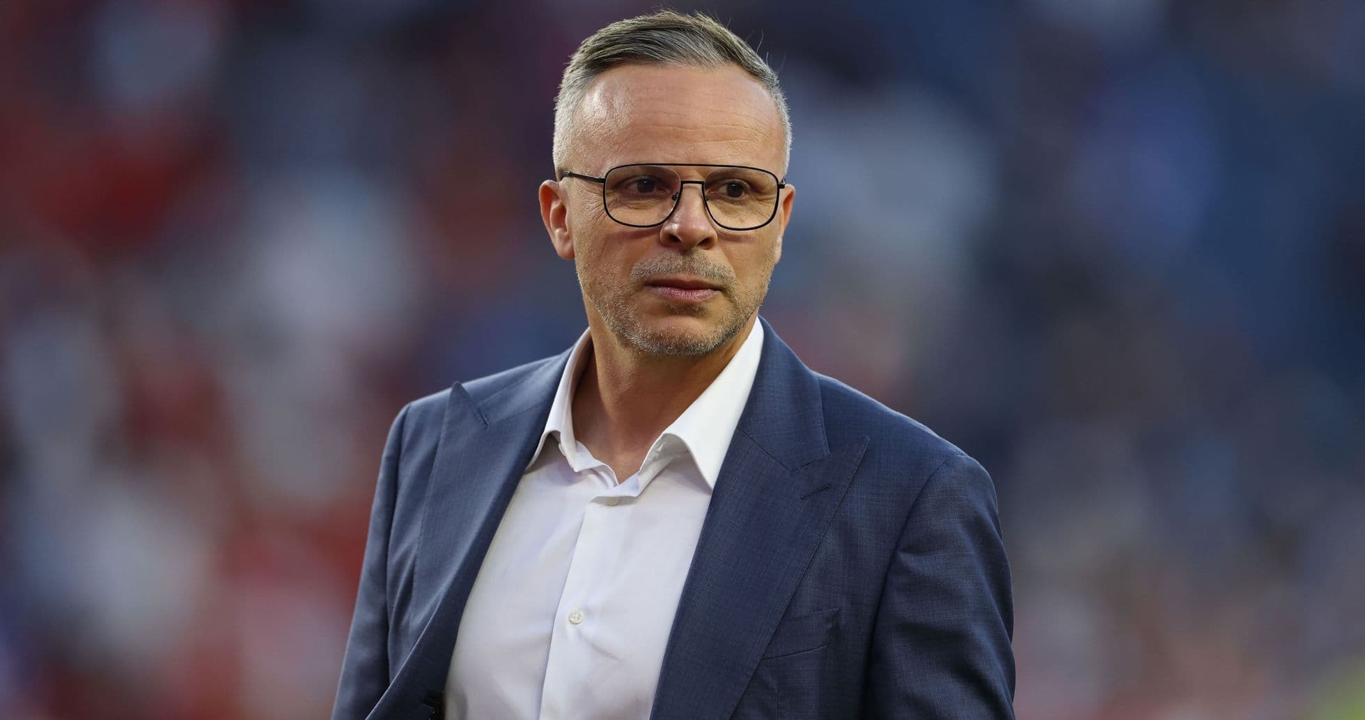 Manager in a suit on the sidelines during match Manager in a suit on the sidelines during match