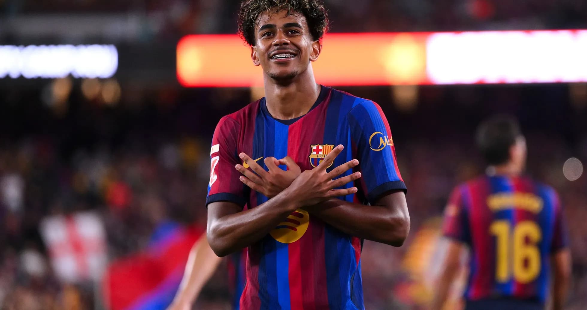 Player celebrating a goal during a match Player celebrating a goal during a match