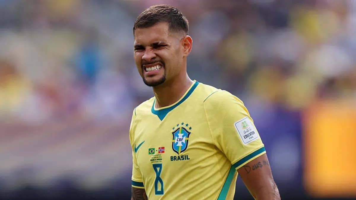 Player grimacing during a match in yellow jersey Player grimacing during a match in yellow jersey