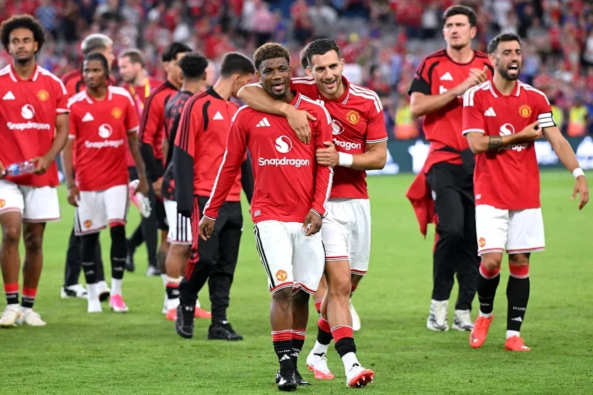 Manchester United players celebrating after the match Manchester United players celebrating after the match