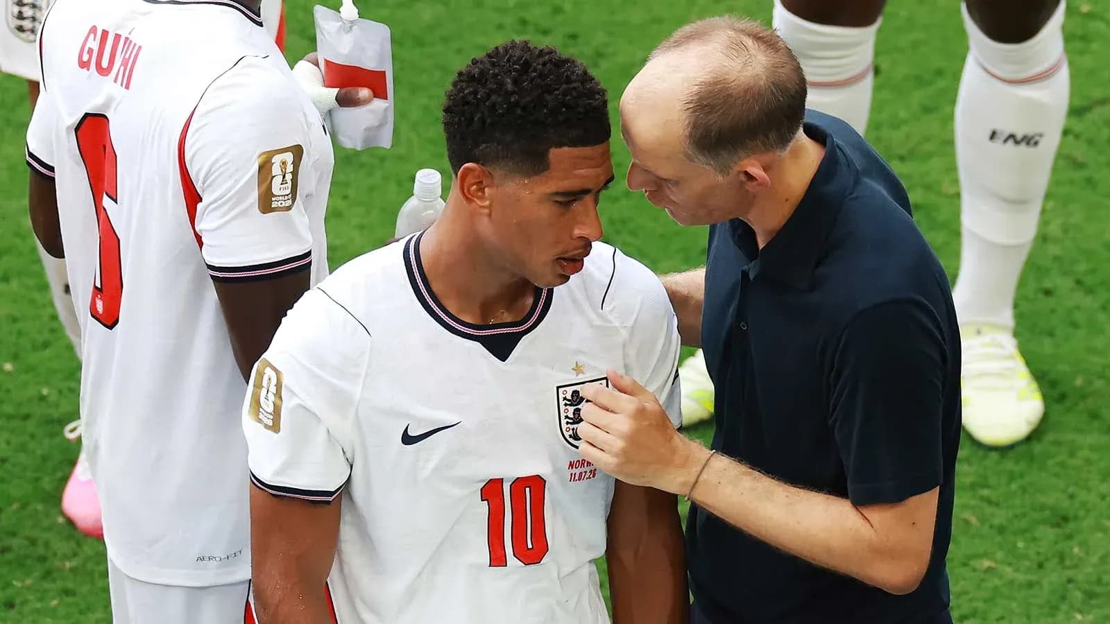 Player receiving instructions from coach during match Player receiving instructions from coach during match