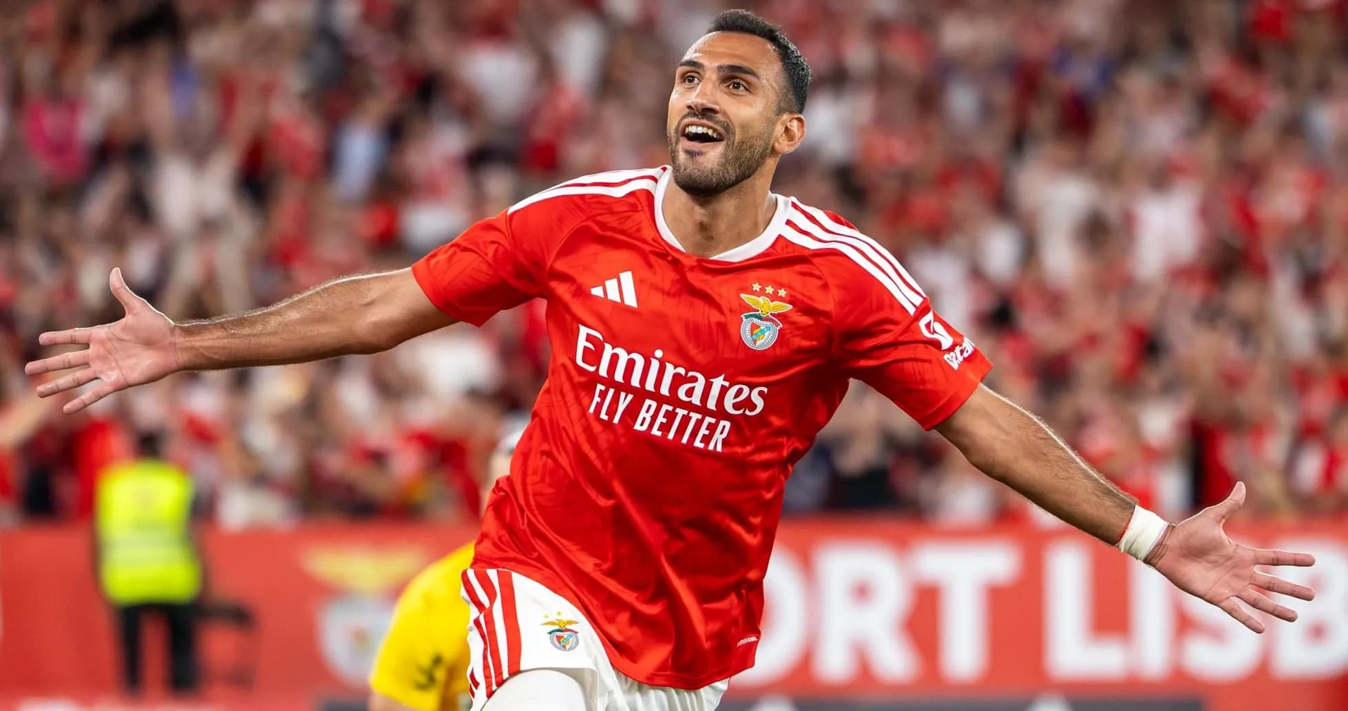 Benfica player celebrating a goal Benfica player celebrating a goal