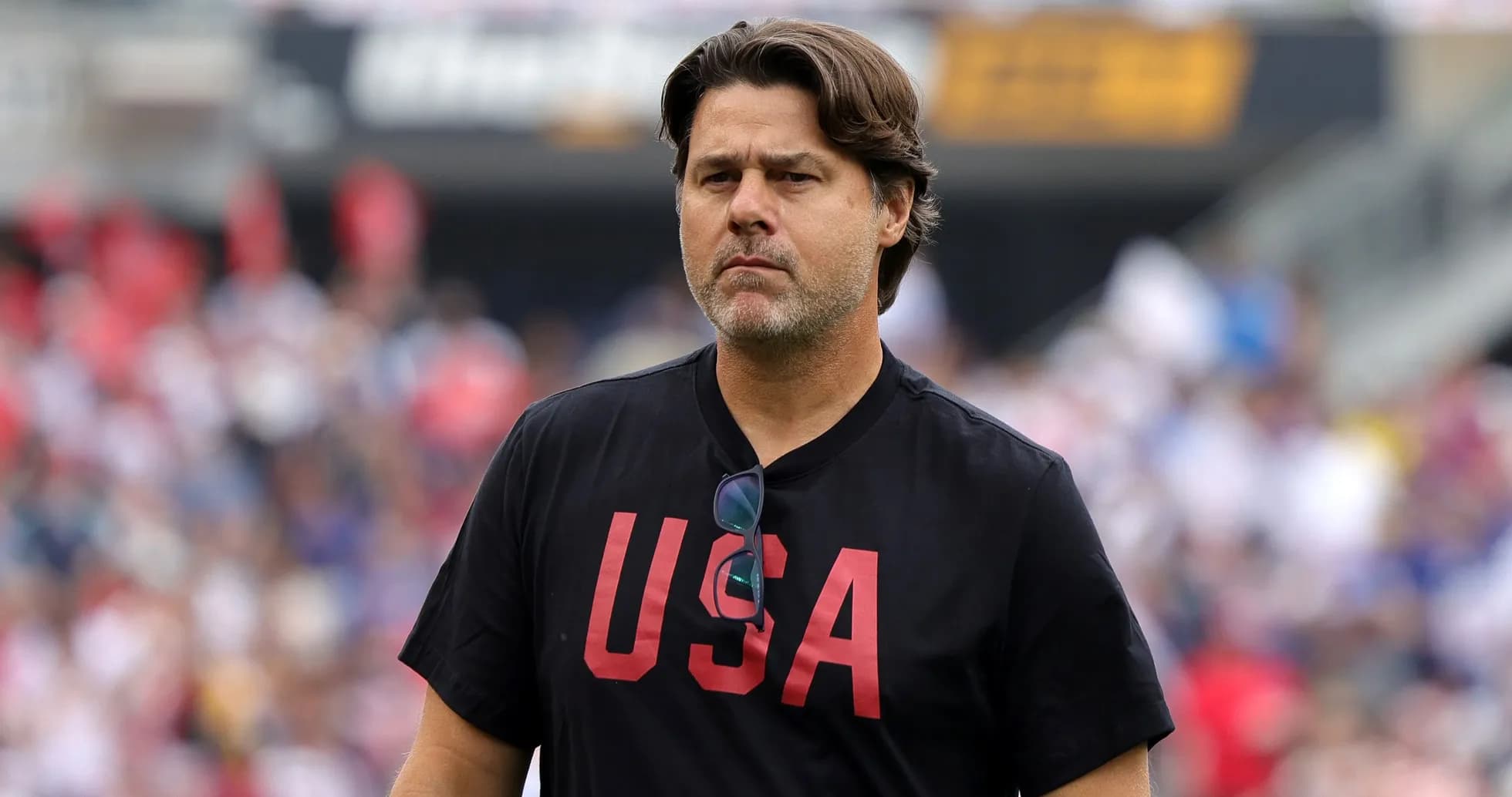 Coach wearing USA shirt during match day Coach wearing USA shirt during match day