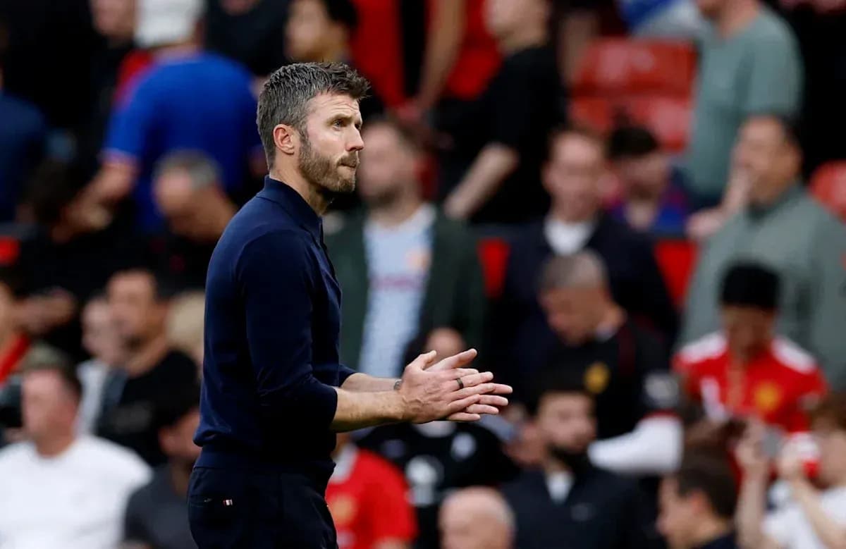 Coach clapping during match at Old Trafford Coach clapping during match at Old Trafford