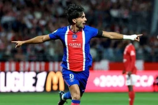 Player celebrating a goal for PSG during match Player celebrating a goal for PSG during match