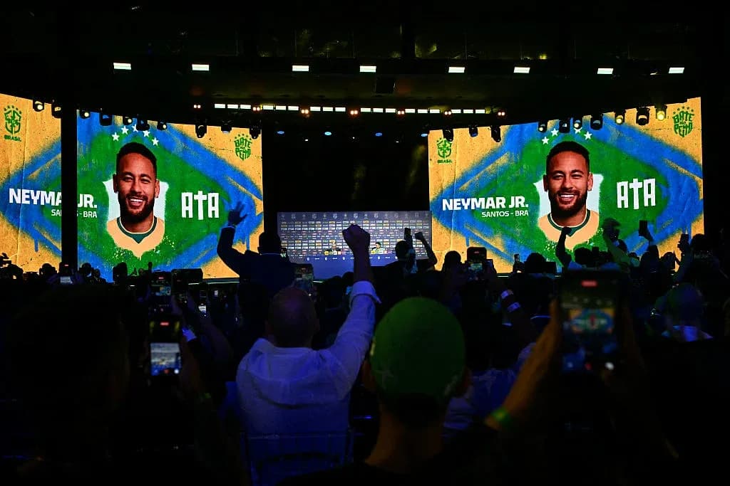 Fans celebrating Neymar Jr. announcement at event Fans celebrating Neymar Jr. announcement at event