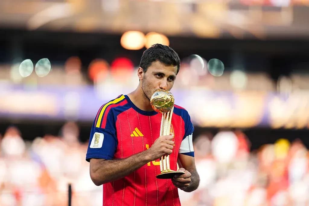 Player holding trophy after winning the match Player holding trophy after winning the match