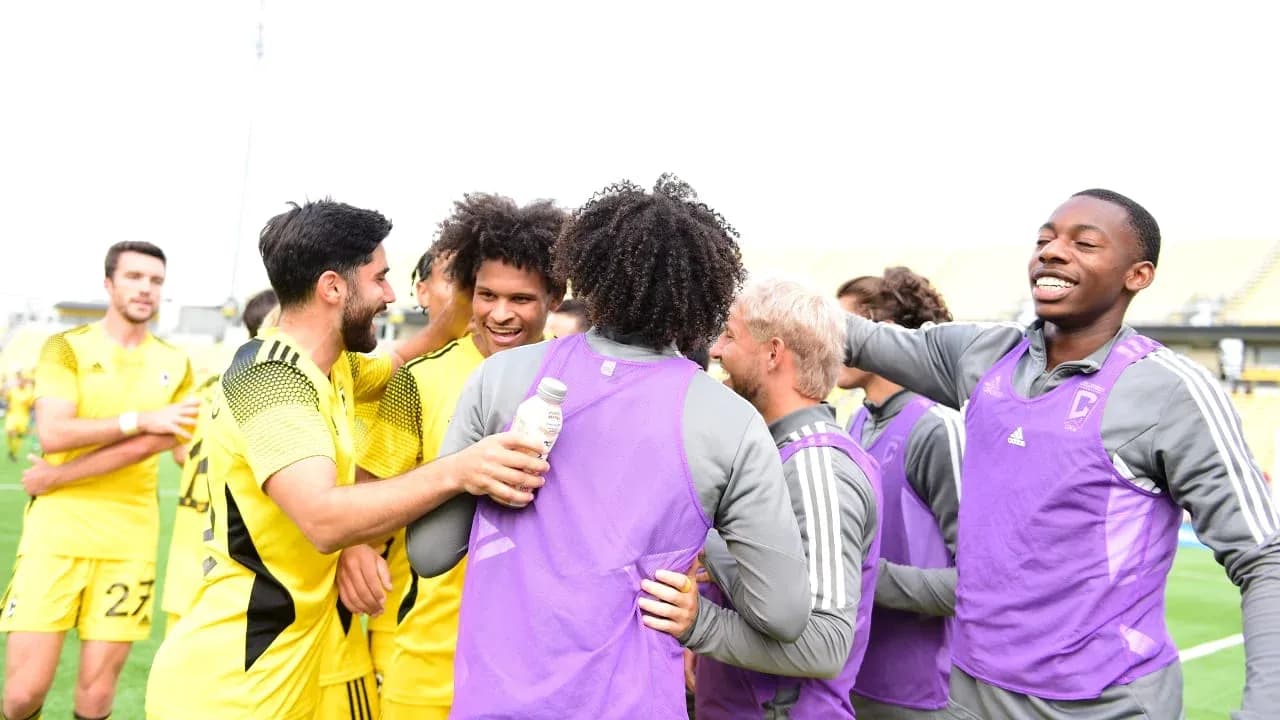 Players celebrating after a match Players celebrating after a match