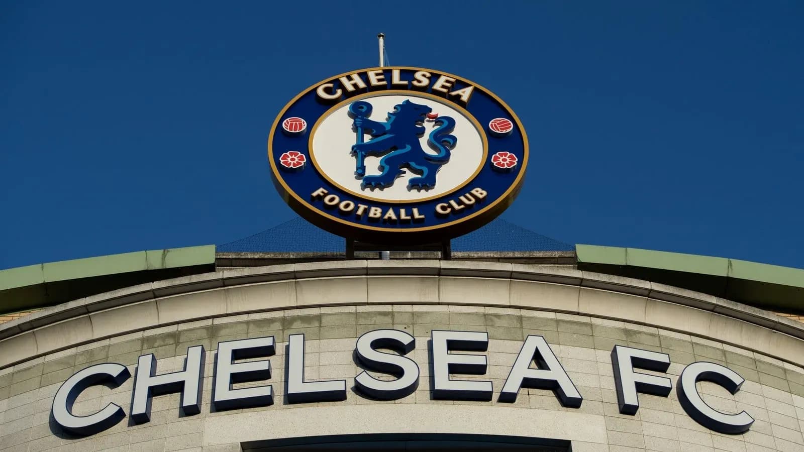 Chelsea FC logo displayed on stadium entrance Chelsea FC logo displayed on stadium entrance