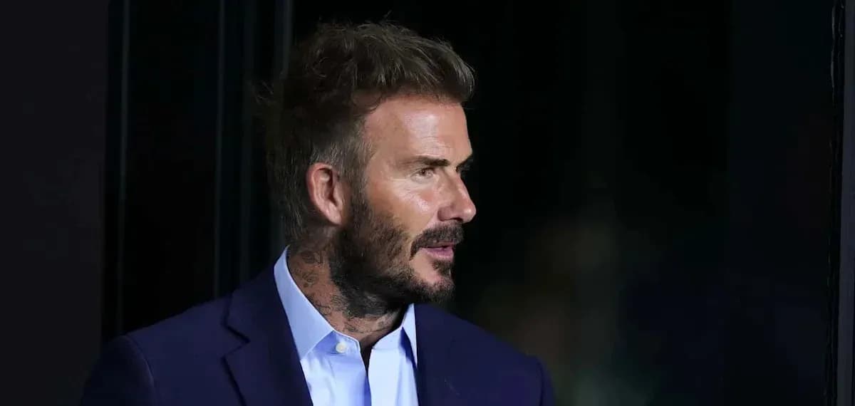 Man with short hair and suit looking to the side Man with short hair and suit looking to the side