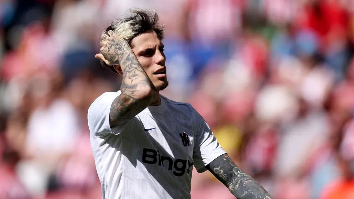 Player with tattoos during match action Player with tattoos during match action